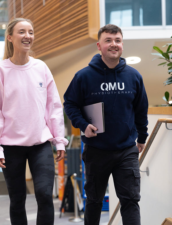 Queen Margaret University students wearing university merchandise